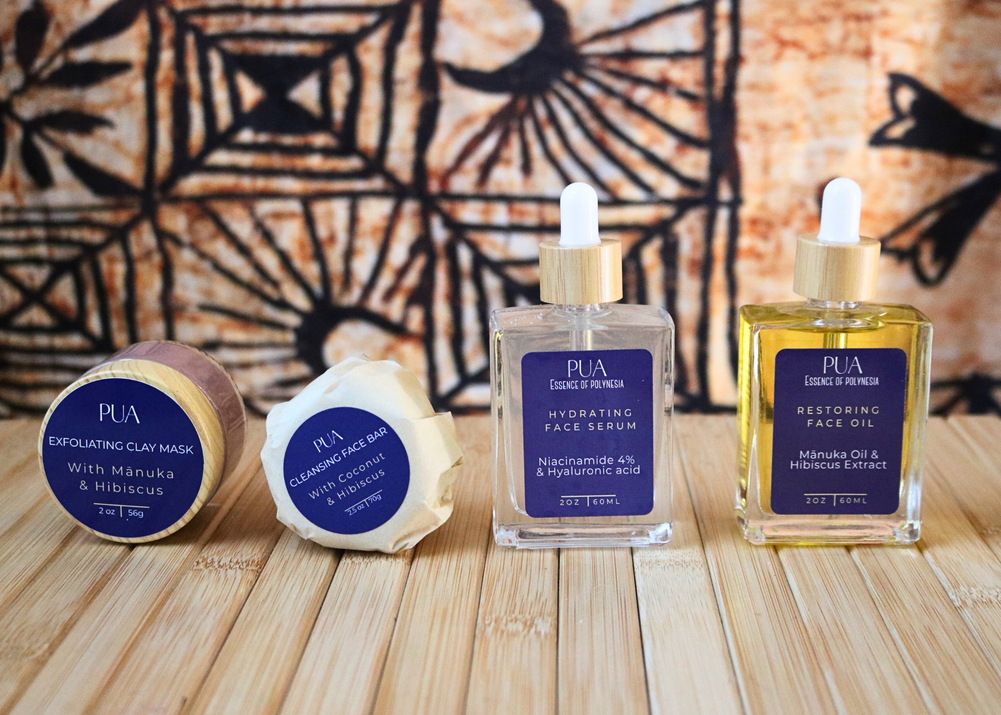 Set of PUA skincare products on a wooden surface with a woven mat background